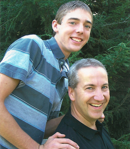 Collin Peters with his father, Kent.