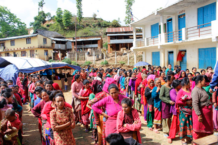 women line up for aid