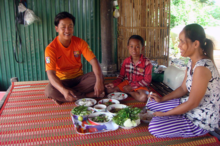 Duk Pisey, 35, her husband So Hong, 35, and their two children are happier and healthier since building their latrine.