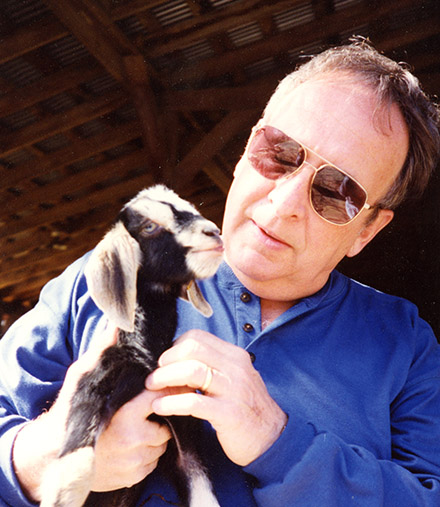 Steve with a goat at Heifer Ranch