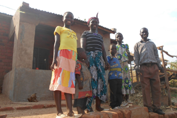 Kelvin Haji with his five children at home in southern Malawi, the area hardest hit by the drought.