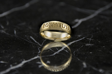 One of the most valuable prizes you can win is this ring, which represents One Favor from Patrick Rothfuss (!). 