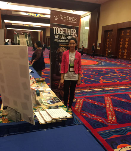 Amy John-Terry staffing an Educator's Conference on behalf of Heifer International