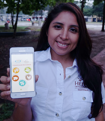 Debora Martinez shows off Heifer Guatemala's award-winning app.