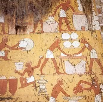 Ancient Egyptian hieroglyphics depicting cheese-making.