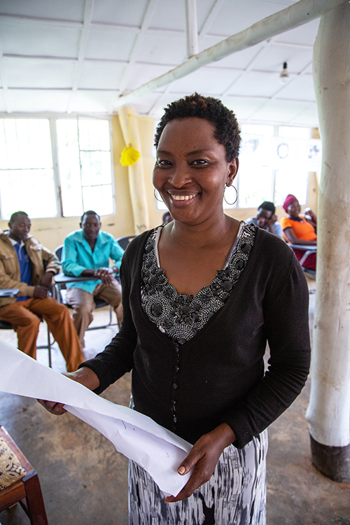 Xaverine Uwimana, the driving force behind Rwanda's EPOG poject, smiles and poses for a photo.