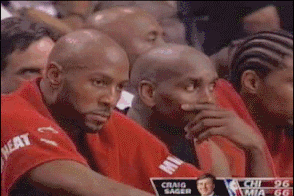 7-time NBA All-Star Alonzo Mourning, thinking about recycling some plastic cups.