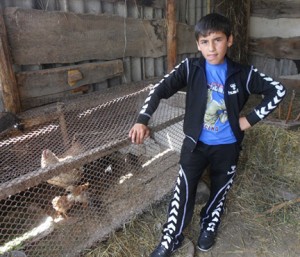 Universal Children's Day: Rudik shows off his poultry farm in Armenia, which he started through a Heifer International project.