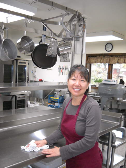 Richard's wife, Jina, volunteering in Kitchen at Heifer Ranch