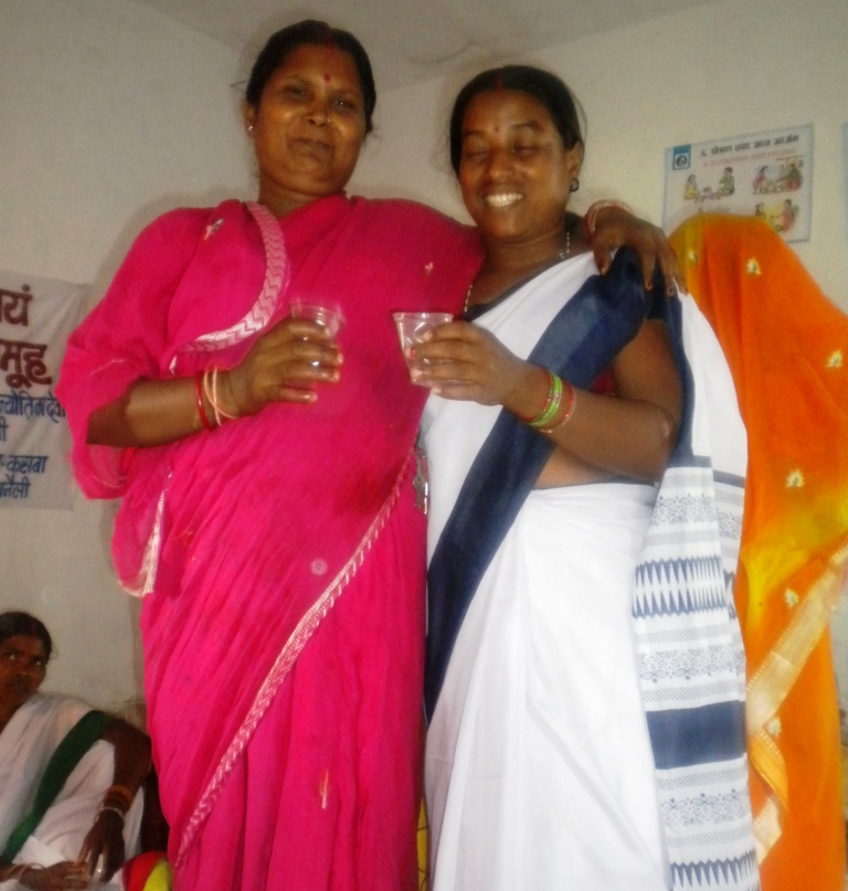 Leela devi enjoys tea with Laxmi Kisku (a project management committee  member of Bhartiya self help group) during a committee meeting.