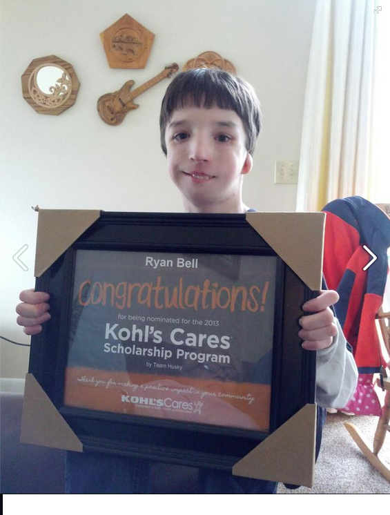 Ryan Bell shows off the certificate he received indicating he was nominated for the Kohl's Cares Scholarship Program. Ryan's teachers nominated him for his work fundraising for Heifer International among other volunteer endeavors. 