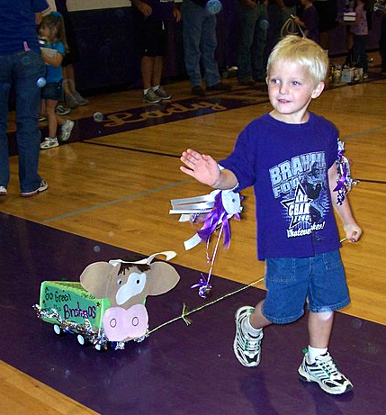 A young student takes part in his schools shoebox parade. Photo credit: stockdale.k12.tx.us