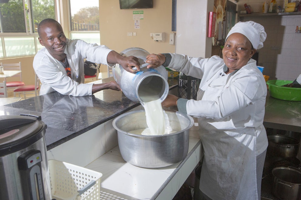 Janet pouring milk into a container
