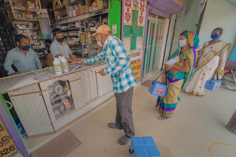 People standing in line for supplies