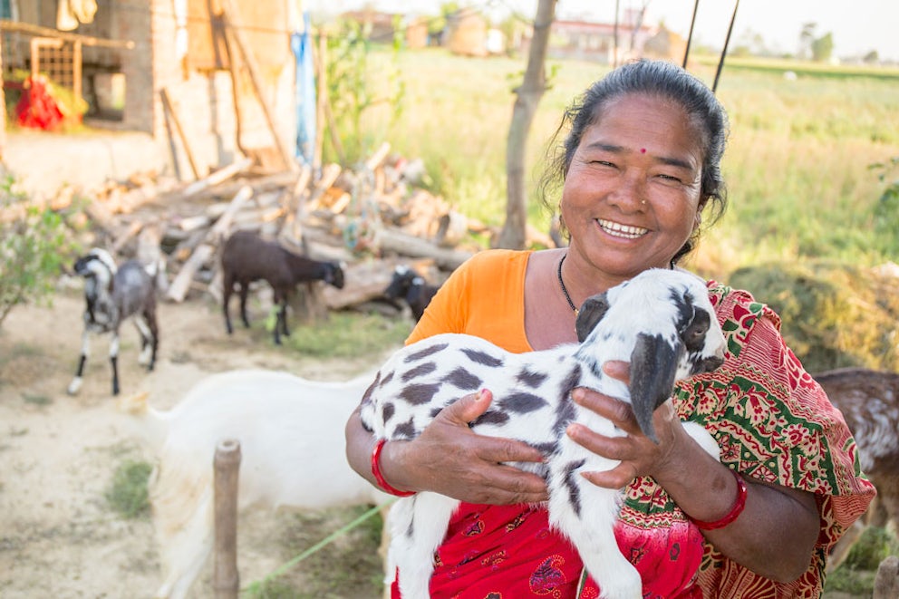 Jit holding a goat