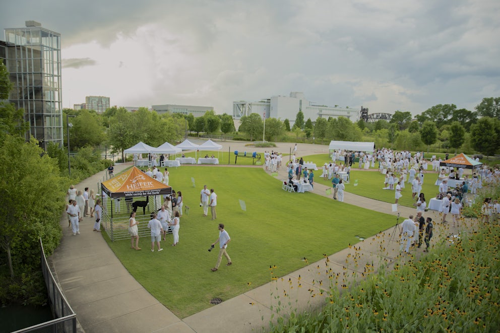 People gathering in a field for the annual event.