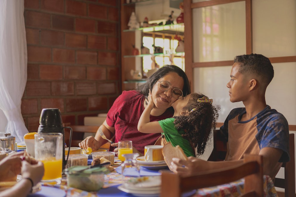 Family eating breakfast together