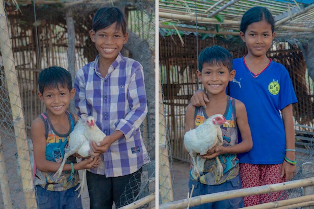 Savi's children holding their chicken