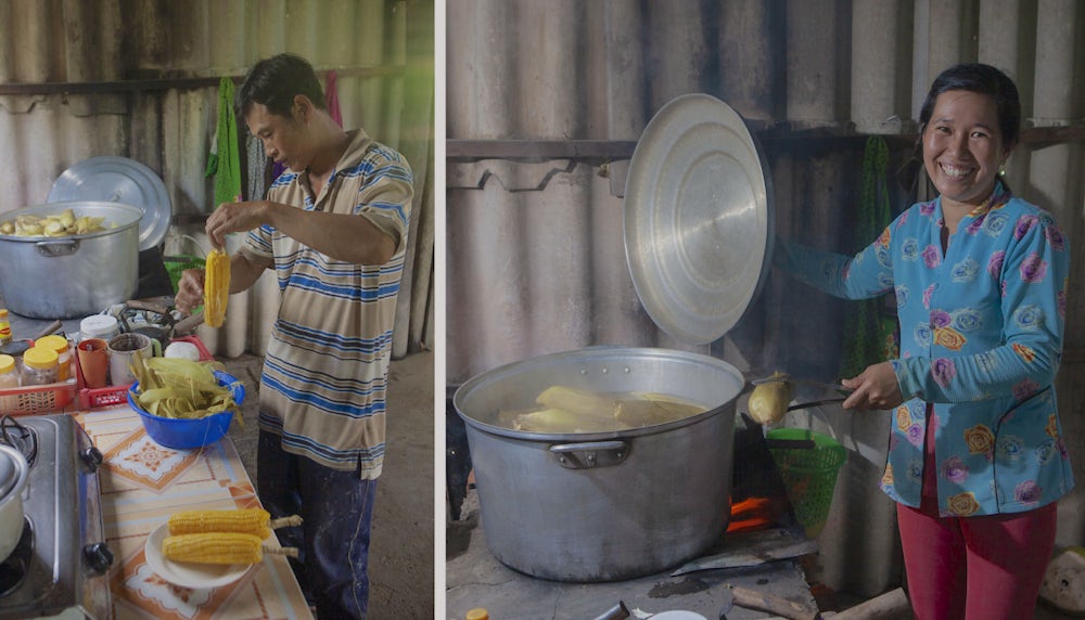 Chau Thi Kim Huong and Truong Tan Kiet work hard for their corn business.
