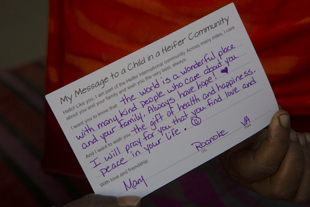 Suktara holds a letter she received from a donor.