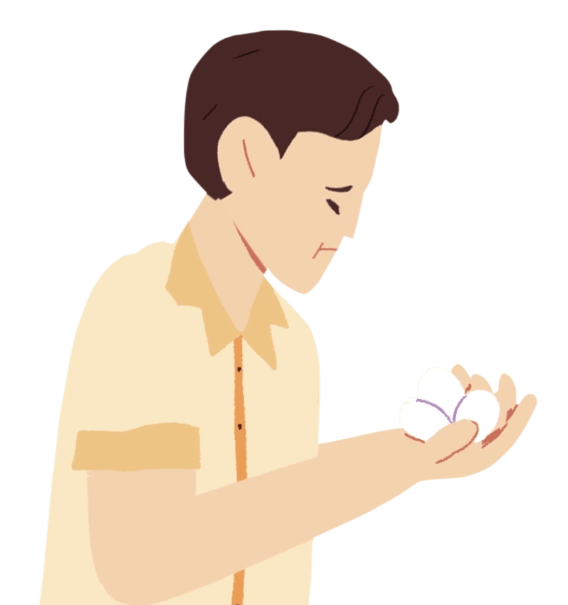 Man sadly looking at eggs in hand