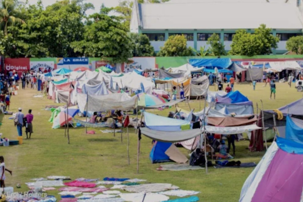 An encampment set up on a soccer field after a 7.2 magnitude quake in Les Cayes, Haiti. Photo by: Ralph Tedy Erol / Reuters