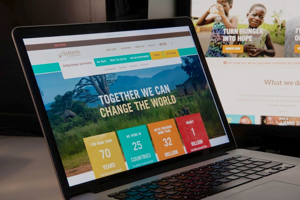 Heifer International's site displayed on a laptop