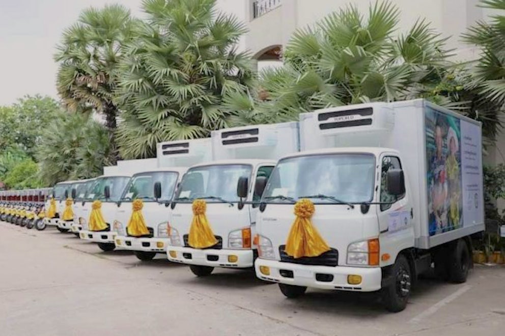 Three cold chain trucks, four non-cold chain trucks and 14 cold chain motorcycles that NGO Heifer International Cambodia handed over.