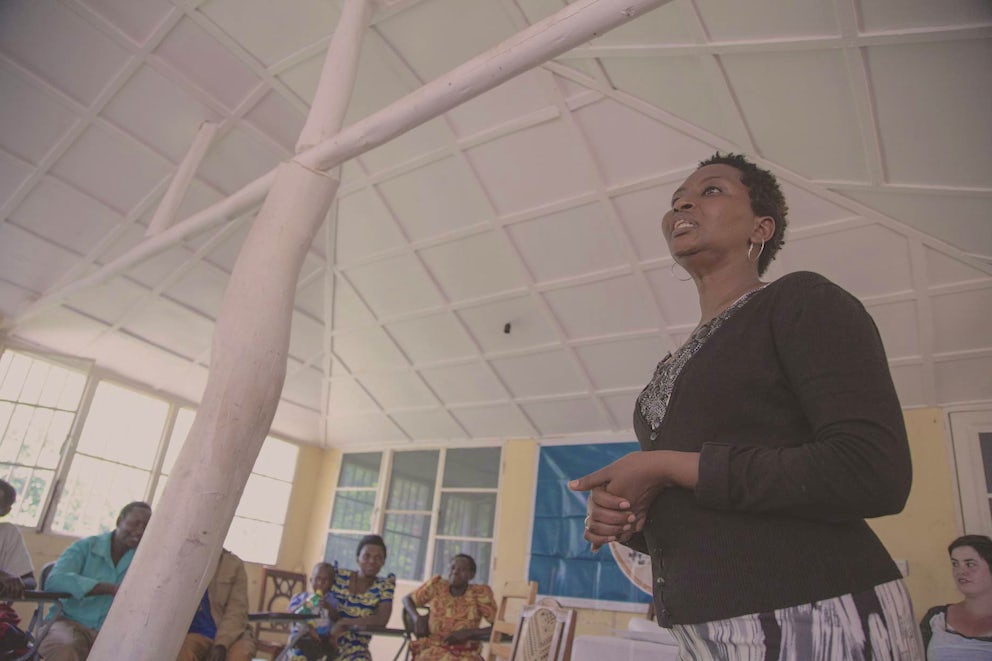Woman speaking at a workshop.