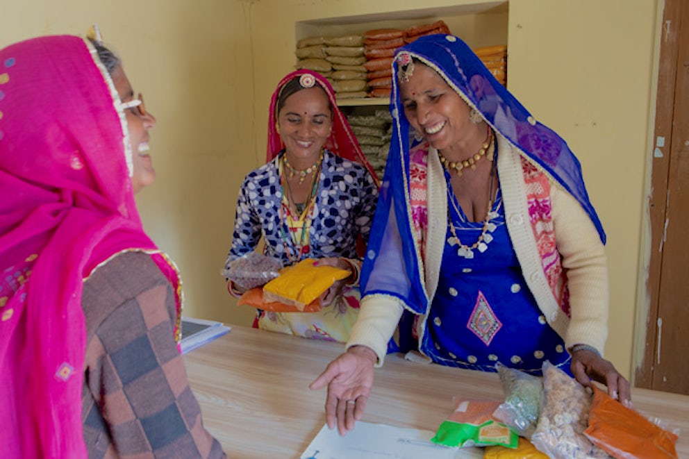 two women selling spices