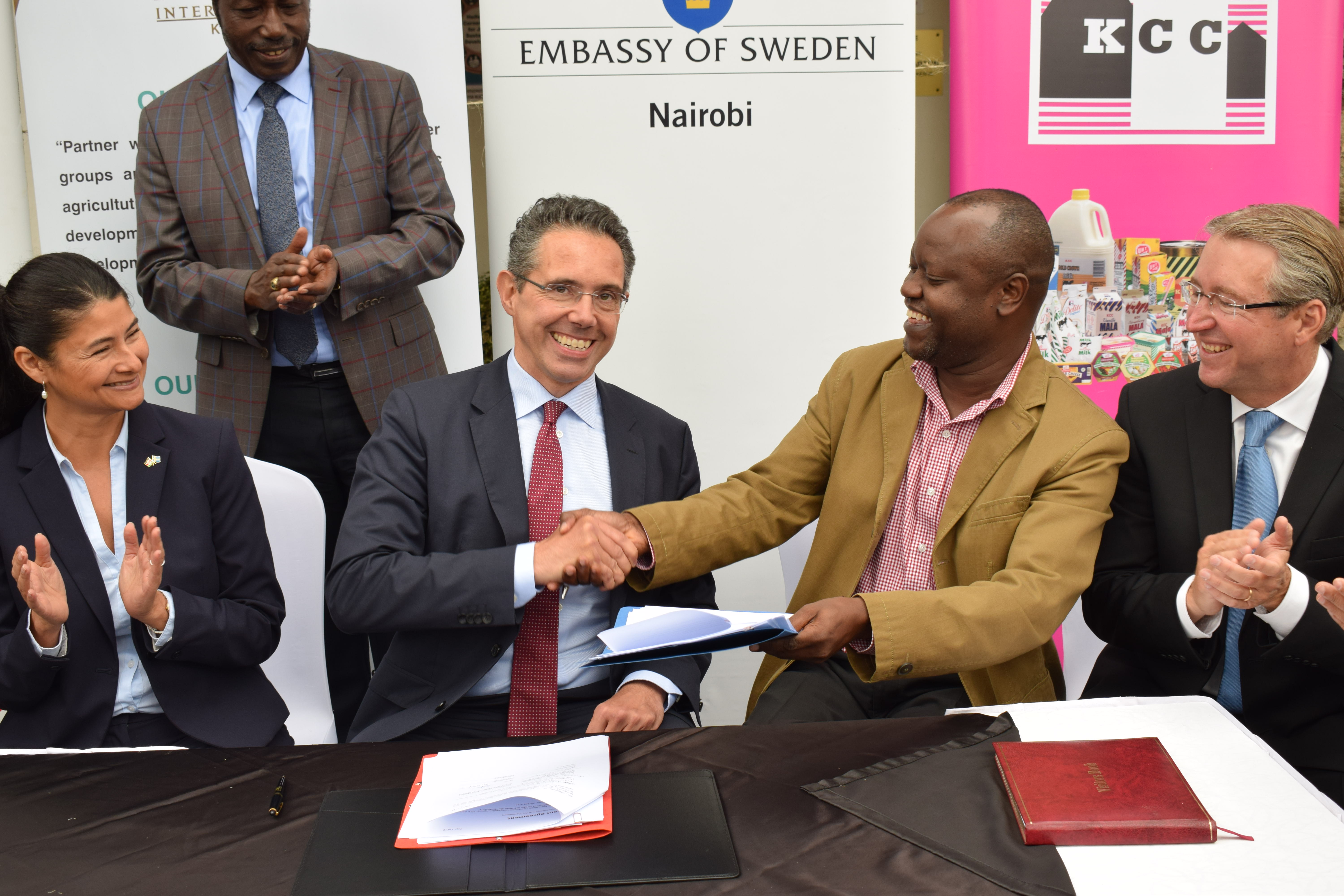 The signing ceremony for the partnership agreement was held Aug. 3 at Heifer’s office in Nairobi.  Seated from left to right: Sanda Diesel, head of Development Cooperation with Kenya at the Swedish Embassy; Swedish Ambassador Johan Borgstam;  George Odhiambo, country director for Heifer in Kenya; and Rafael Fábrega, director of Tetra Laval Food for Development.