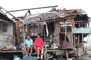 Nilda Adriano and husband at their home, which was hit by Super Typhoon Haiyan
