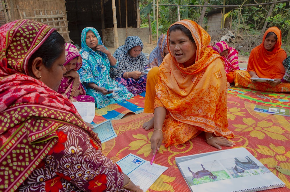 A woman leads a training on animal well-being.