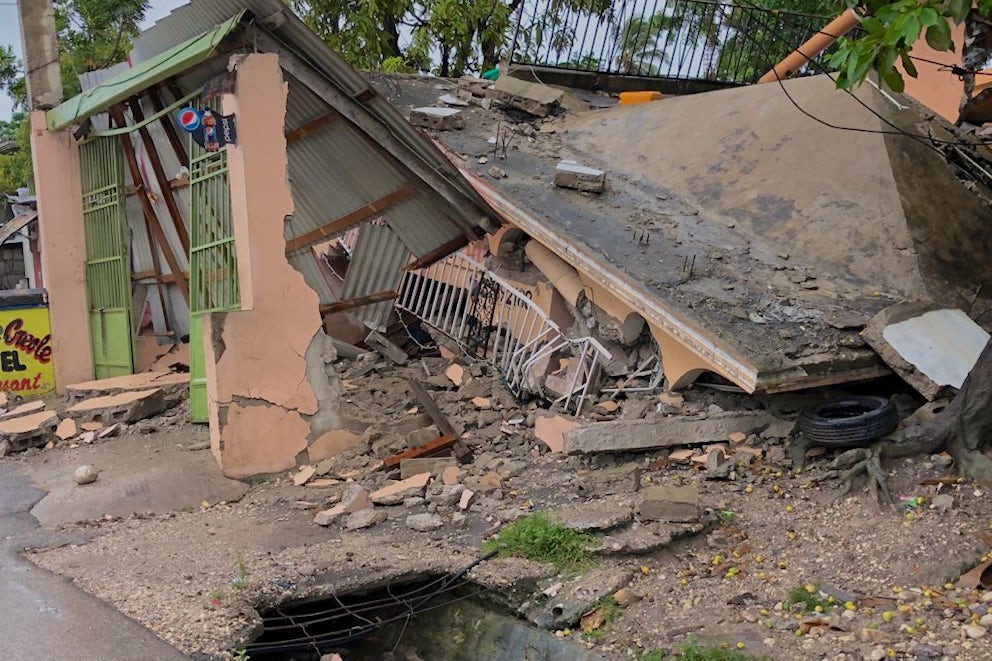 A building in Haiti reduced to rubble from the recent 7.2-magnitude earthquake.