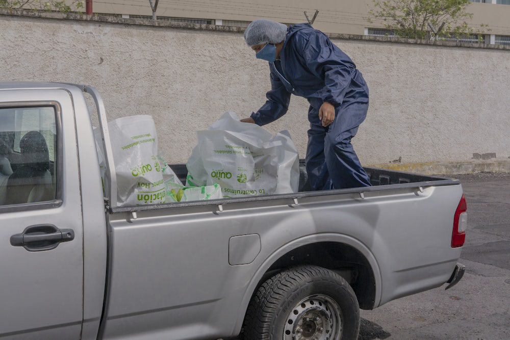 Truck delivering food from Heifer-supported farmers to customers in Quito. 