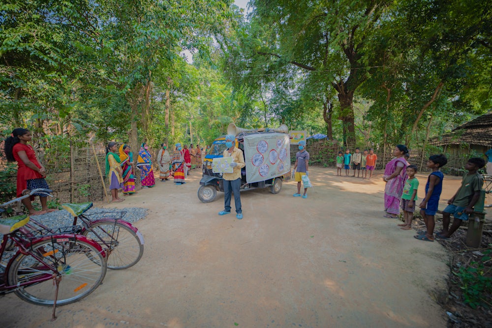 Project staff of Heifer India educating community about biosecurity and safe poultry production practices.