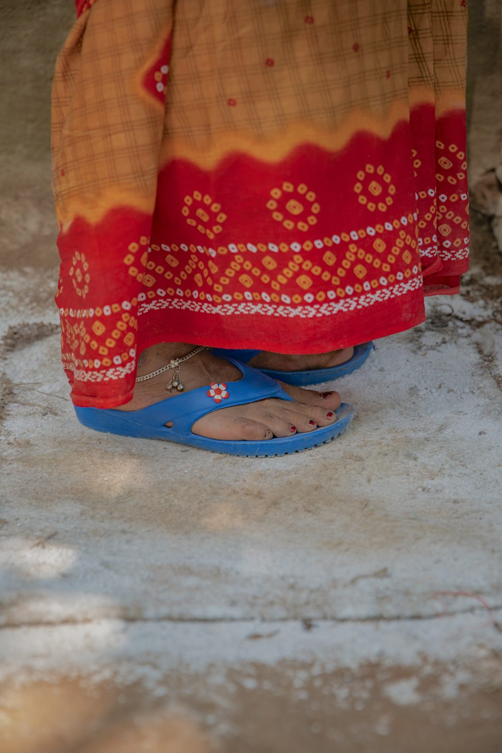 The Hatching Hope Project trains smallholders to in low cost, effective methods to keep their chickens healthy. A quicklime footpath is cheap and kills pathogens. Image by Heifer International/Pranab K. Aich