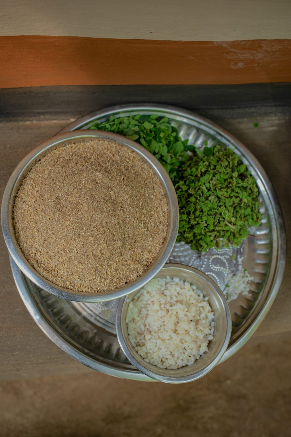 A diet of protein rich foods, including the water fern Azolla and termites along with broken rice helps chicken gain weight. Photo Pranab K. Aich/Heifer International 