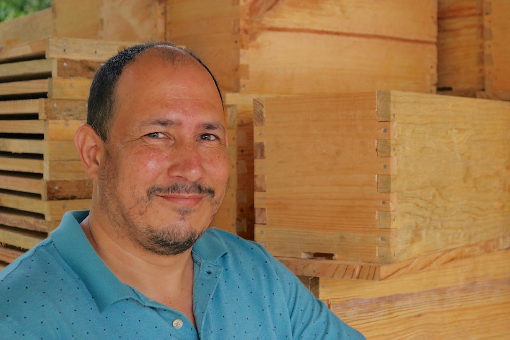 A close up shot of a Honduran man's smiling face.