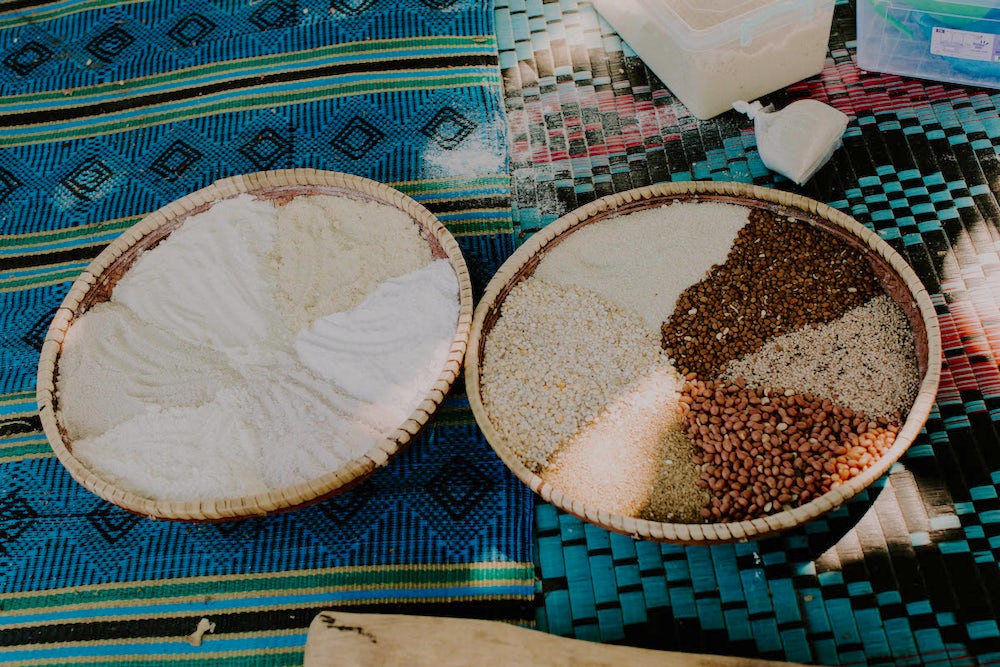 A versatile and healthy mixture made from locally grown grains and legumes is boosting children’s health. Photo by Lacey West.