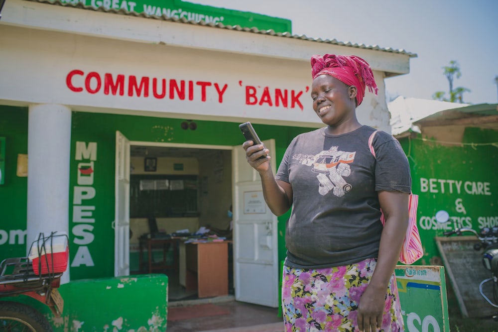 A woman with a mobile phone.