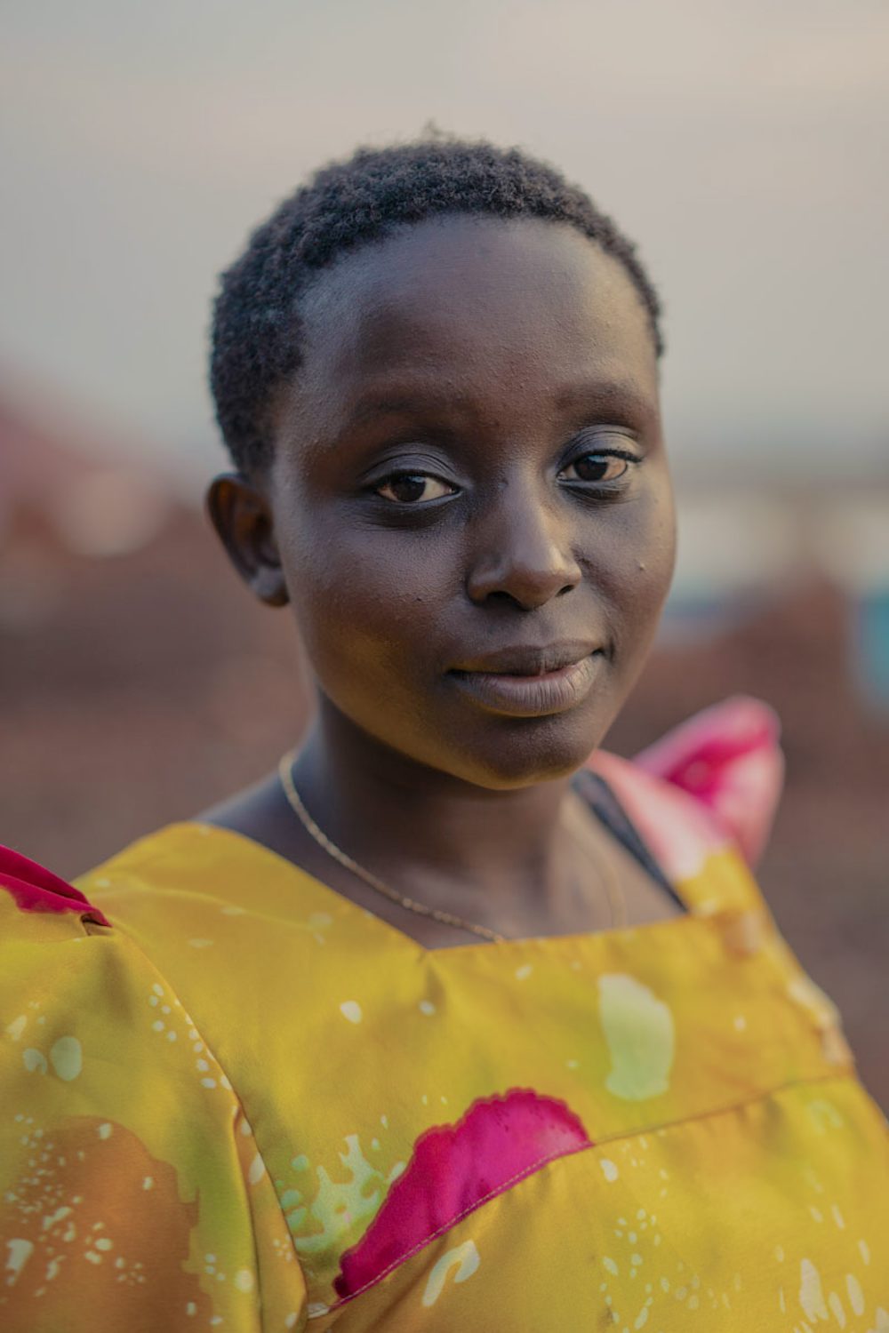 A portrait of a young woman in Uganda.