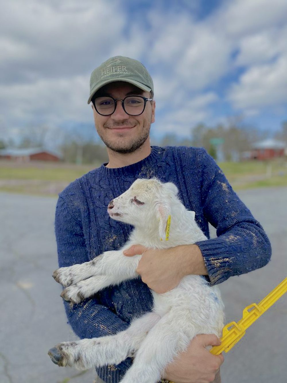 man holding lamb