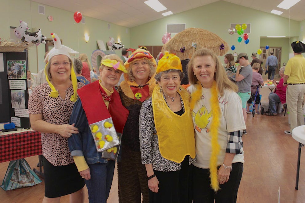 Group of women participating in living gift market