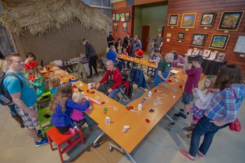 Large group of people with children at a craft festival at Heifer International